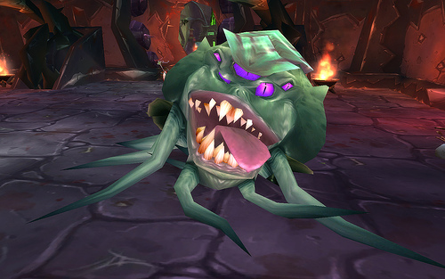 Screenshot of Broggok, the many-eyed, green boss in Blood Furnace