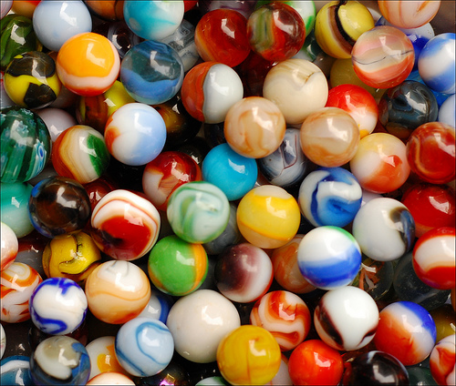 Photo of many coloured marbles